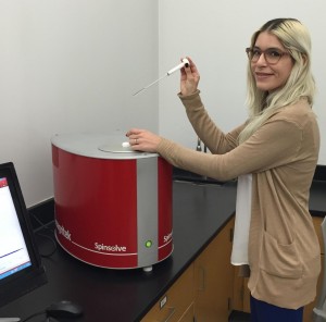 Learning about NMR at Long Beach City College, sophomore Patricia Romine with the Magritek Spinsolve Benchtop NMR.